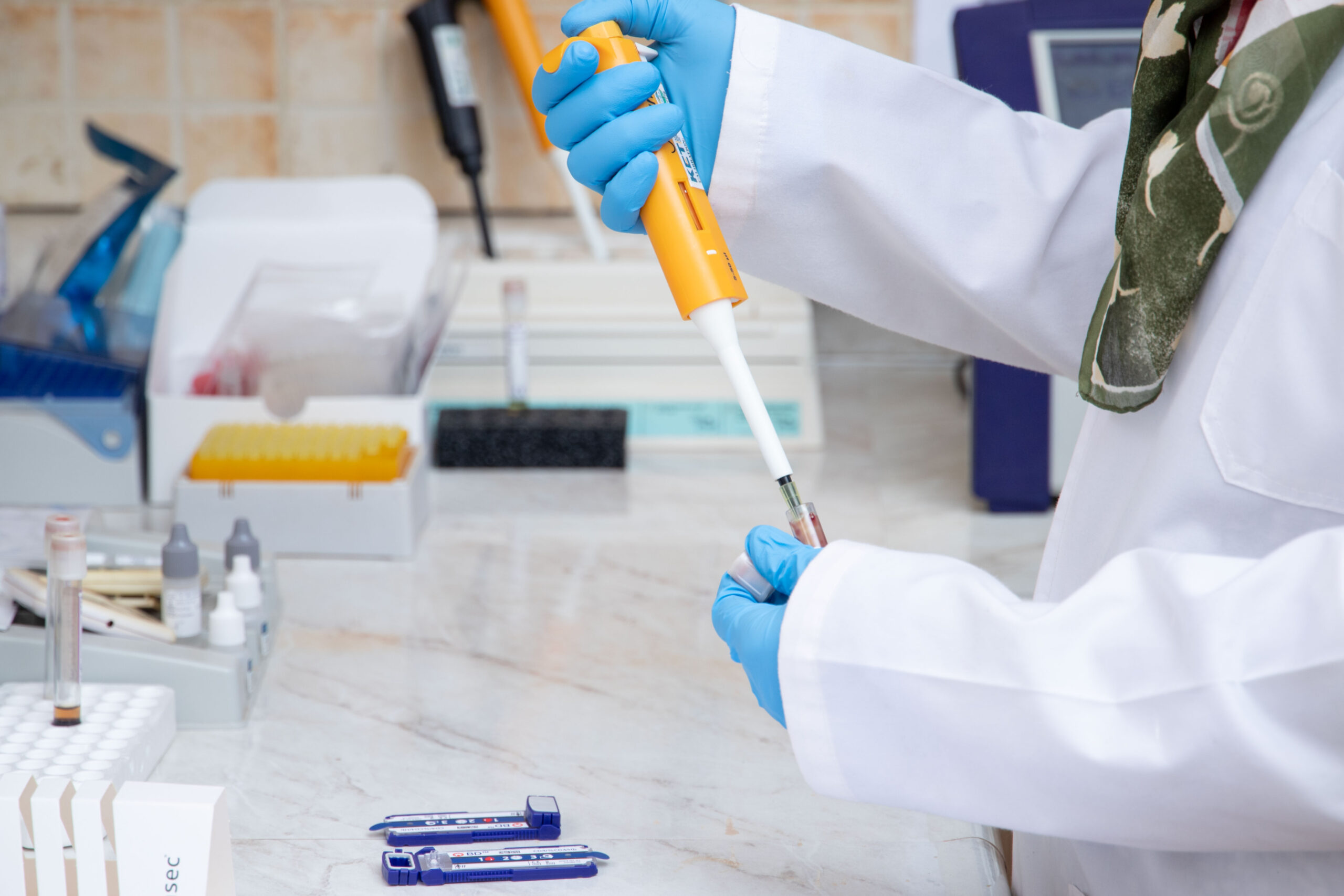 A laboratory worker preparing a sample.